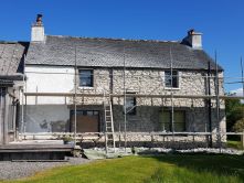 Old roughcast being removed