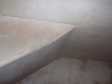 Coombed ceiling plaster skim